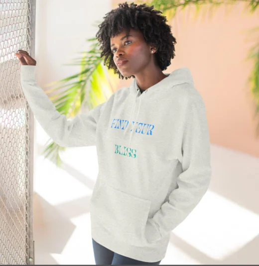 Woman wearing a Find Your Bliss fleece hoodie